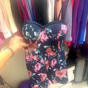 Adorable romper. So flattering. Too small in chest. Worn once